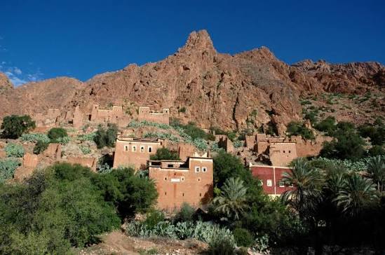The Anti-Atlas landscape around Tafraoute — rose-coloured granite peaks and Chleuh Amazigh villages in one of Morocco's most distinctive and least-visited regions