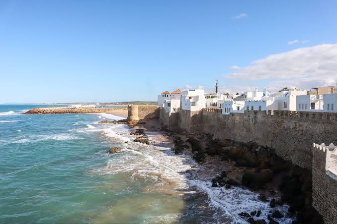Asilah's white-walled medina and Atlantic ramparts — one of Morocco's most graceful coastal towns
