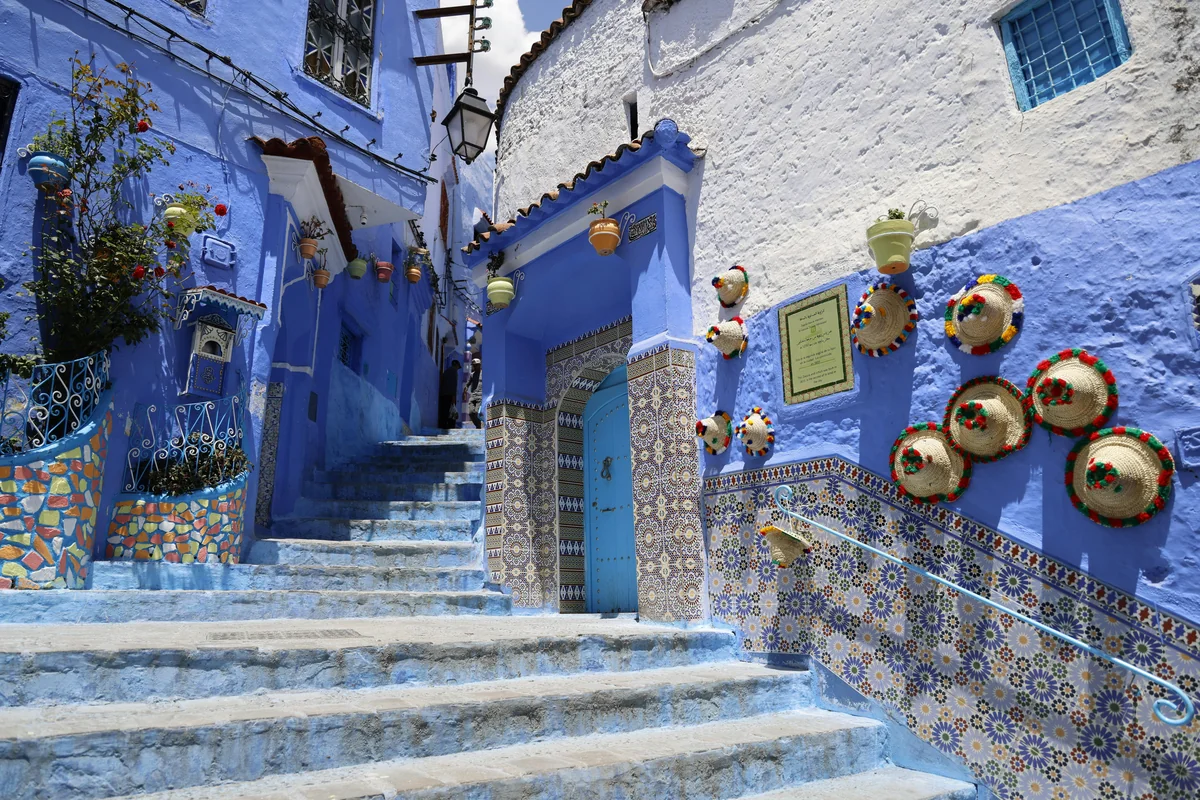 Chefchaouen's blue medina spread across the Rif Mountain hillside, Morocco