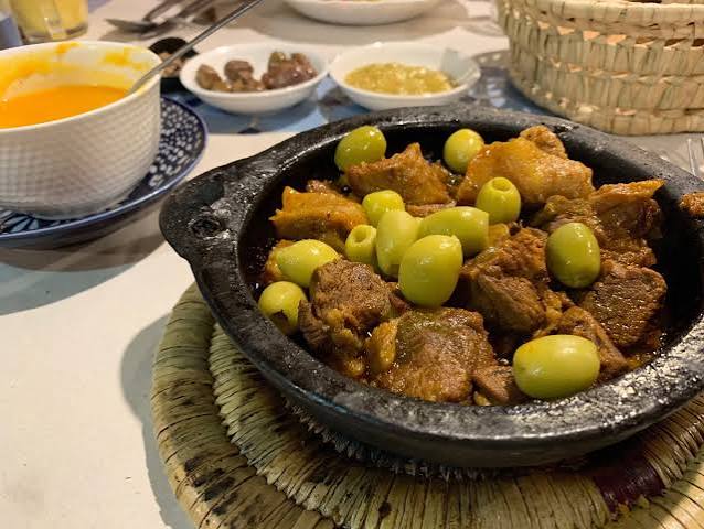 Traditional Moroccan food served in Chefchaouen — bissara soup and fresh bread