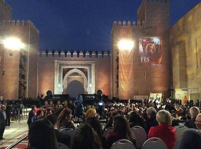 Illustrative image of a festival audience at a sacred music event in Morocco