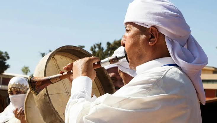 Illustrative image of a world sacred music performance at an open-air festival venue in Morocco