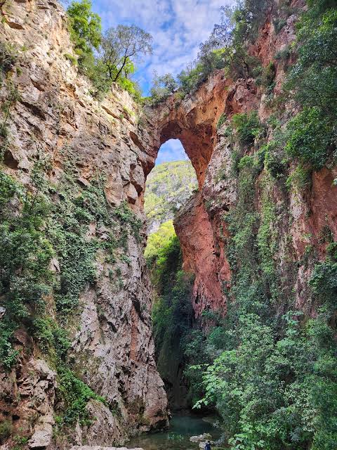 God's Bridge — the natural rock arch near Akchour, estimated at 25 metres high