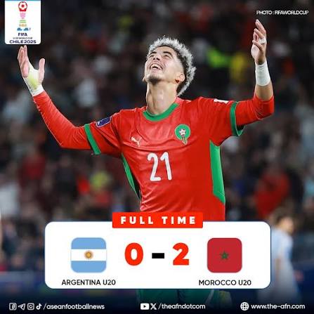 Yassir Zabiri celebrates after scoring in the FIFA U-20 World Cup final — Morocco's scoreboard shows 0–2 against Argentina at full time