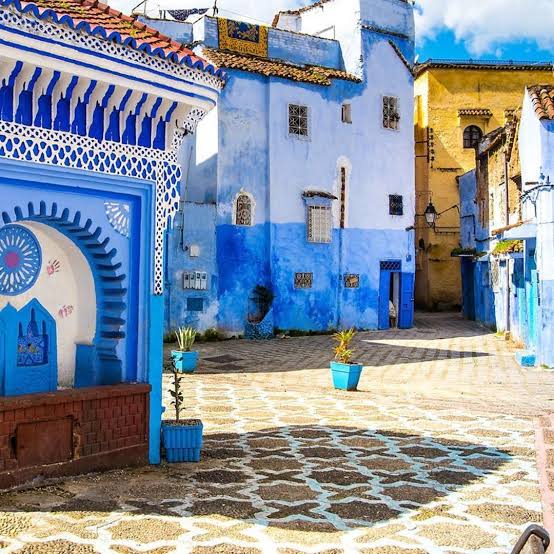 Place Outa El Hammam — Chefchaouen's central square with the Grand Mosque