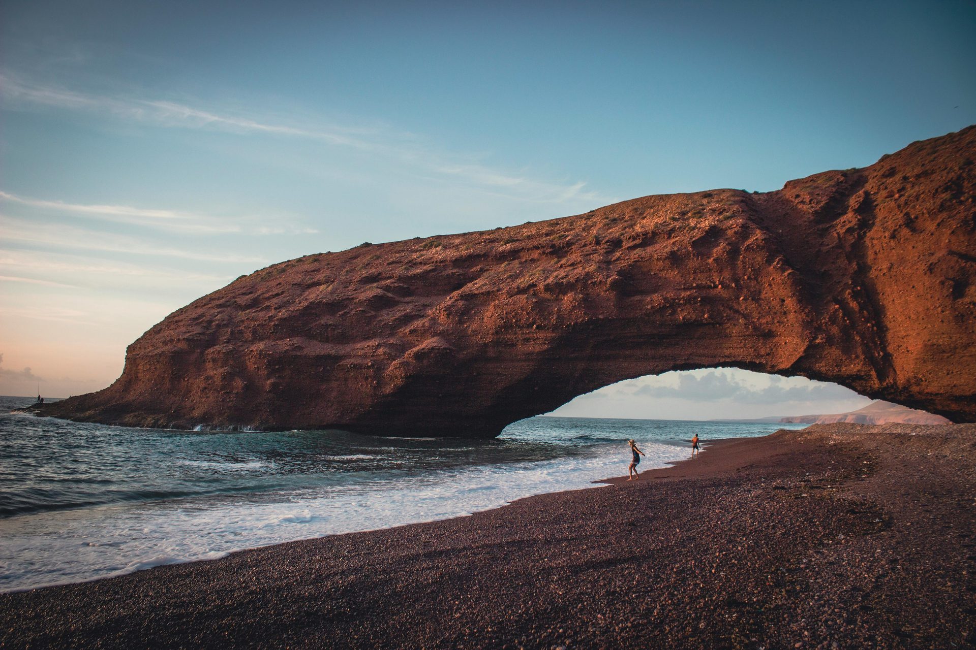 Legzira beach red rock arches Morocco