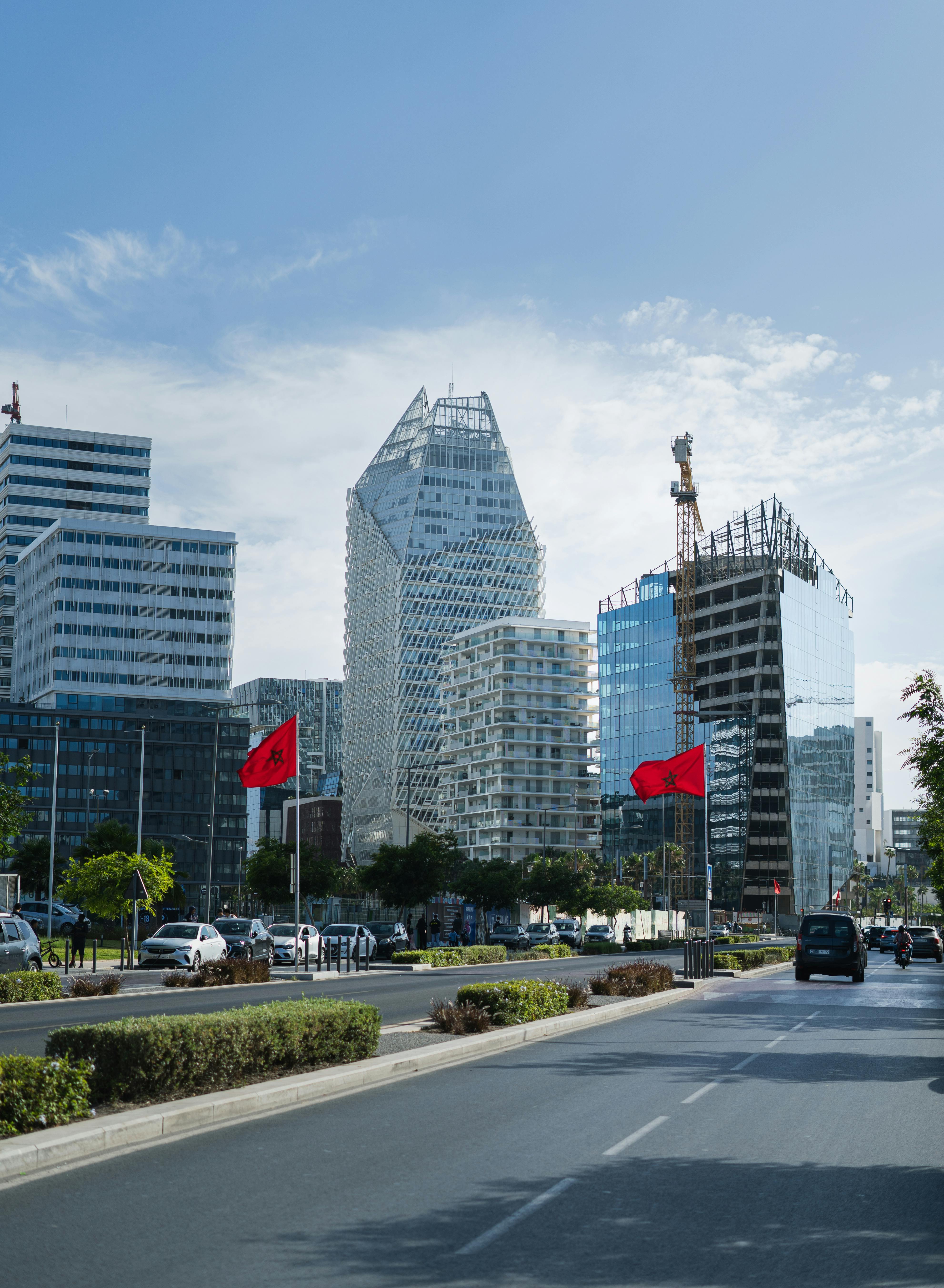 Casablanca modern skyline with Moroccan flags