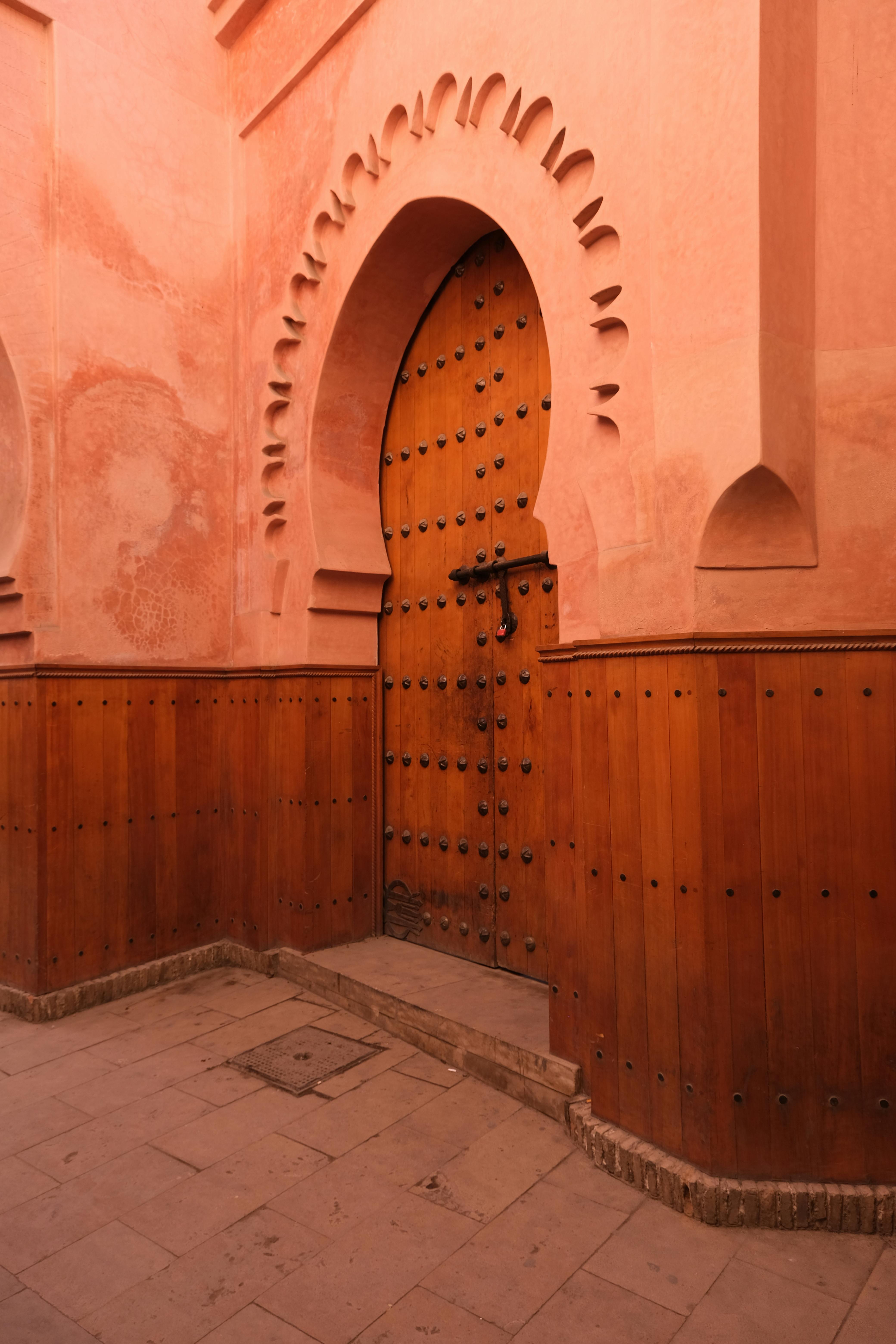 Ornate carved plaster archway inside a Fes riad