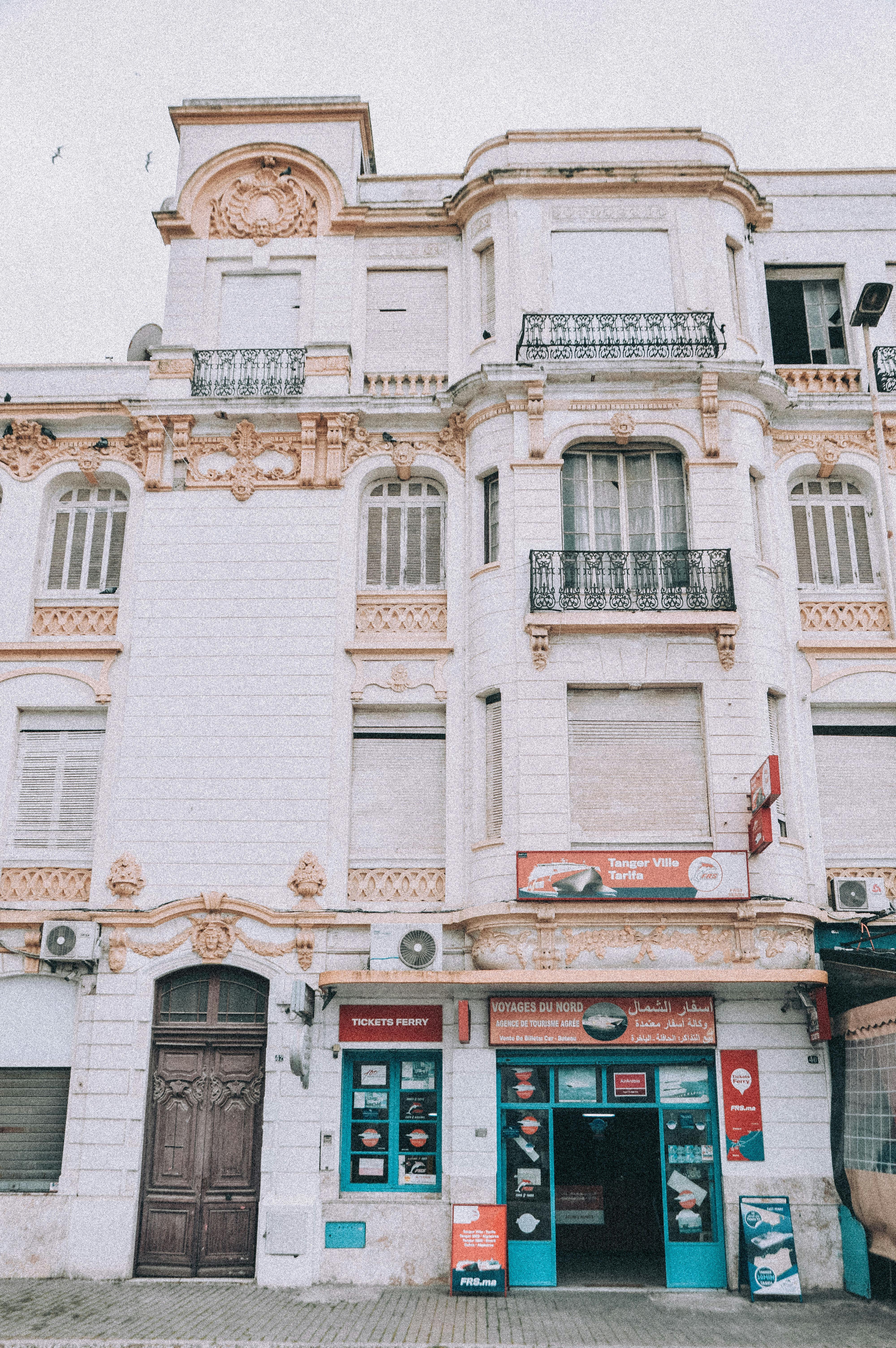 Ornate colonial-era building facade in Tangier's Ville Nouvelle